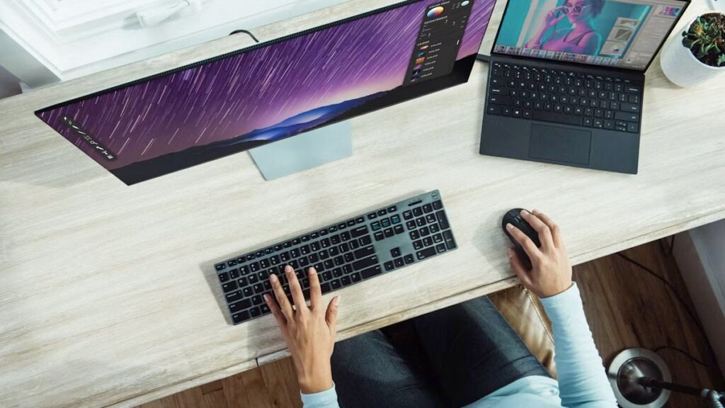 windows 11 update troubleshooting landscape Person checking Windows 11 Update settings on a laptop